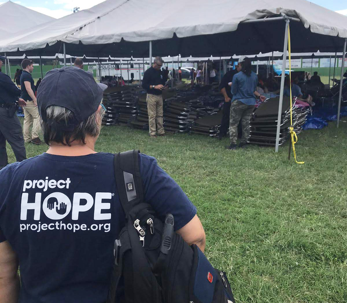 Project HOPE staff arrives at an earthquake shelter to help.