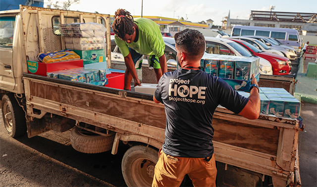 Project HOPE staff distribute supplies after Hurricane Dorian