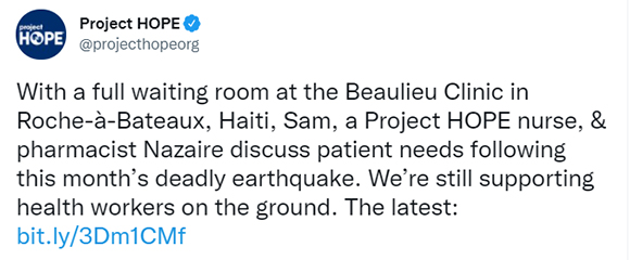 Screenshot of a tweet from Project HOPE reading: With a full waiting room at the Beaulieu Clinic in Roche-à-Bateaux, Haiti, Sam, a Project HOPE nurse, & pharmacist Nazaire discuss patient needs following this month’s deadly earthquake. We’re still supporting health workers on the ground. The latest: https://bit.ly/3Dm1CMf