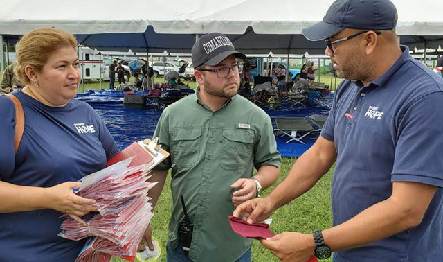 Project HOPE team members train the mayor of Guayanilla.