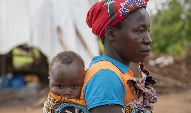 A mother in Mozambique travels with her baby