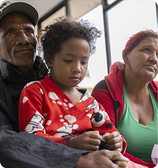 Jesús, a migrant from Venezuela leading his family of 11 to Ecuador in hopes of finding stability, safety, and a chance to work.